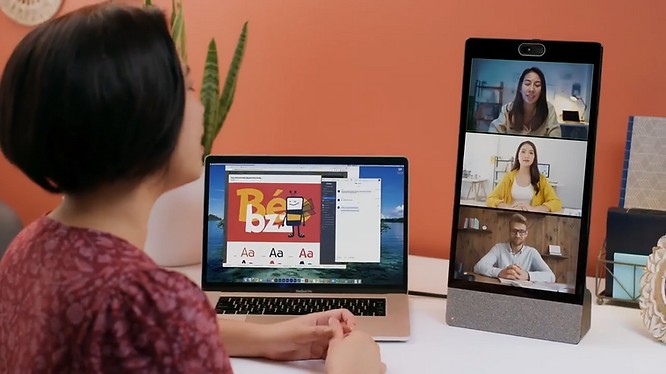 A woman having a video conference via Zoom