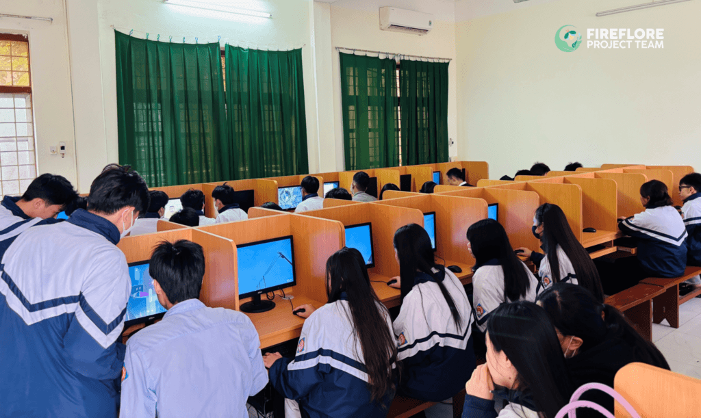 A full classroom of students at Yen Hung School explores the Firefly Memories VR world on desktop computers