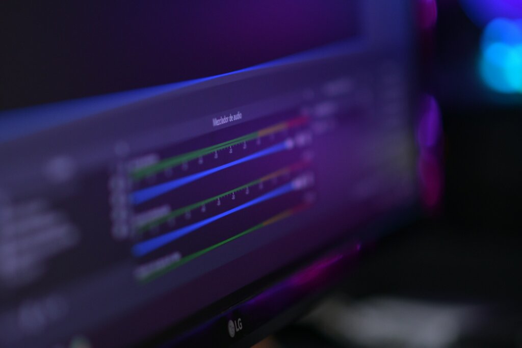 A computer screen showing audio levels in a streaming software setup with audio tracking panels.