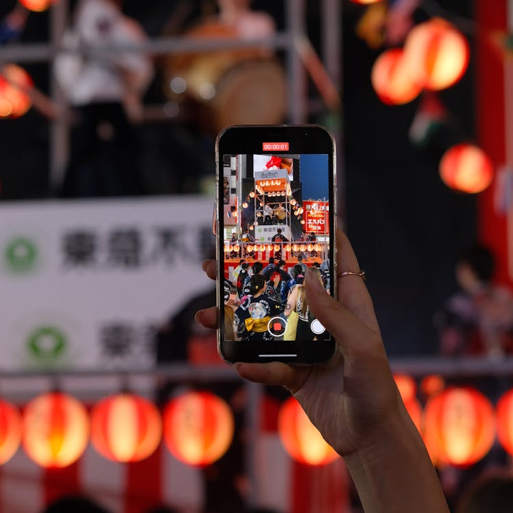 Vibrant festival atmosphere in Shibuya, Tokyo at night with colorful crowd and city lights