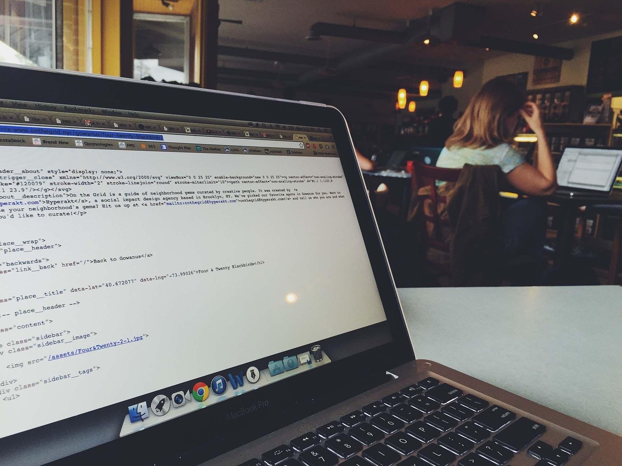 A laptop displaying code on screen, the everyday setup for an AI-assisted vibe coding session