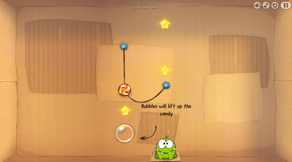 Cut the Rope gameplay screen showing a rope, a bubble, and Om Nom waiting for candy